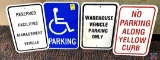 Handicapp parking, reserved faulicty management vehicles, no parking along yellow curb, warehouse