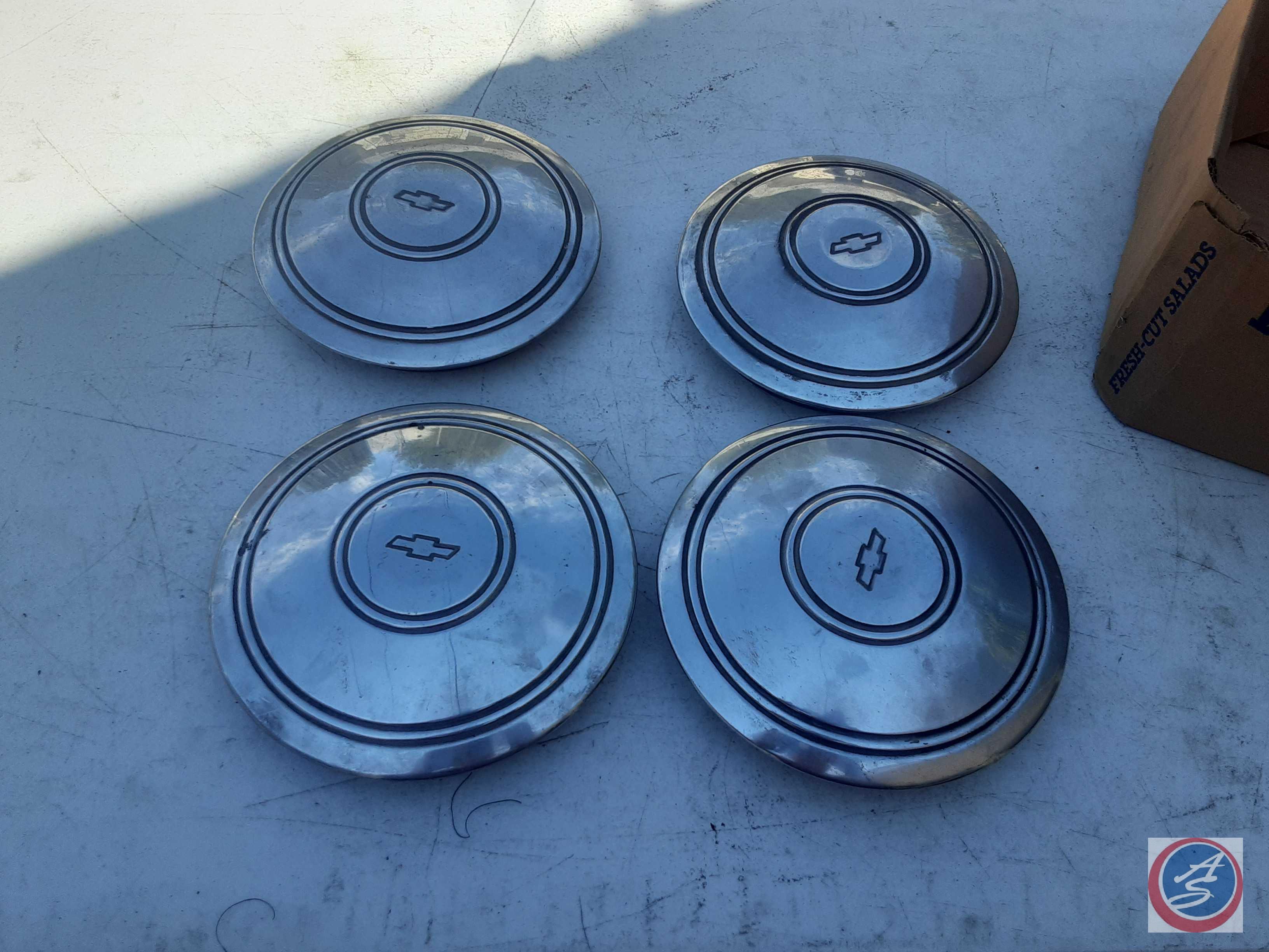 Chevy baby moon hubcaps Proxibid