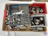 Router bits, assorted sockets, assorted springs
