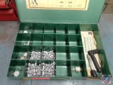 Metal Box with dividers containing Assorted Dies.