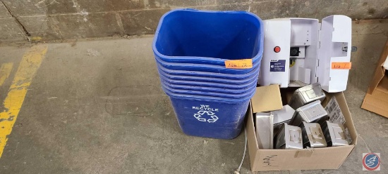 Blue Trash Cans and Eco Lab Hand Sanitizer Dispenser.