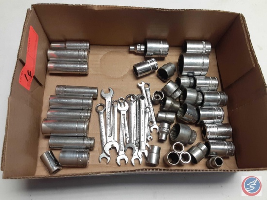 assorted metric sockets and small metric wrenches