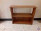 Wood 2 shelf was hand made to coordinate with library table (Lot 129) was made out of a shelf, door