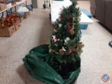 Christmas Tree in a pot , comes with bag.