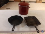 Old Mountain cast iron grill pan, cast iron pan and a Large red soup pot.