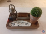 (1) Flat of assorted Items: Bell, Plaque, potted artificial bush, Elephant.