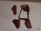 (4) leather holsters one holster has U.S. on it