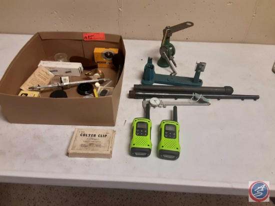 (1) flat of miscellaneous gun stuff, and two Motorola walkie talkies, and a dial indicator
