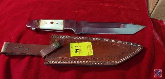 Hand Made Damascus Knife with leather sheath .