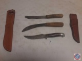 (3) miscellaneous knives and(2) leather sheaths