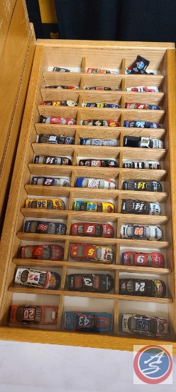 Shadow Box with approximately 36 small nascars
