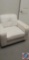 (2) white leather chairs