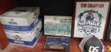 Shubee original shoe covers (2) boxes, various trophy plaques, DS3 baseball cap, various office