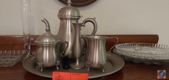 Decorative serving platters, a divided serving platter, a crystal vase... stainless steel tea pot.