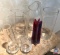Assortment of glass vases, a candle and a glass pitcher,