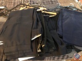 An assortment of dress pants, casual pants, approximately 38 to 42 waist and... 29 inches in length