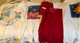Women?s assorted T-shirts, workout pants suits, all range from size fits most to small to medium