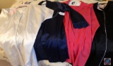 An assortment of women?s nightgowns and robes, various sizes from small to medium