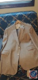 For men's suit jackets some with pants, variety of materials and styles jackets ranging in size 42