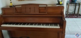Kranich & Bach Piano with bench, table lamp on top of piano