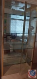 Glass China cabinet with mirror back and lights, two full length glass doors with magnetic strips