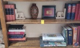 Books, elephant book holders, vase, a picture
