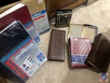 Assortment of photo albums and picture frames