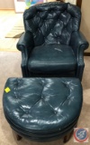 Leather chair and ottoman, both items are on wheels