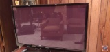 Samsung Flat Screen TV & Wood TV stand with 3 glass Shelves.