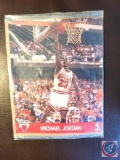 2 Michael Jordan pictures in plastic