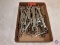 a flat of assorted wrenches