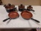 a set of(5) Farberware pots and pans appear to be new never used