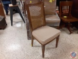(6) dining room chairs, they appear to be Re upholstered. One chair does have arms the rest do not.
