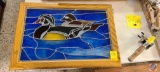 Hanging duck stained glass.