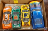 A variety of die cast cars, Most of the cars are model race cars. There are Four matchbox semi