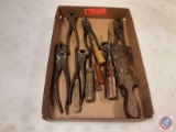 flat containing assorted pliers and screwdrivers