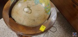 World Globe on wood stand, it plugs in and spins