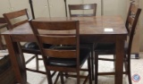 High setting wood Table (4) Matching Chairs w/ vinyl seated chairs