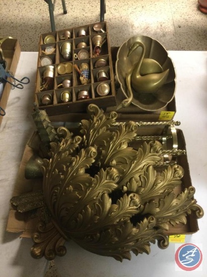 Assortment of brass colored decor. Including figurines, wall hanging decor, stands, and miniature