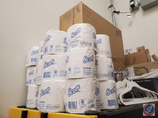 Scott toilet paper, and velvet like hangars. Unsure if the boxes of toilet paper have been opened.