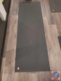 Manduka brand yoga mat, both sides of the mat are textured. Lot includes three yoga mats.