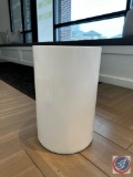 Silver colored lidded trash can and round white trashcan. Trashcans do have some wear to them. See