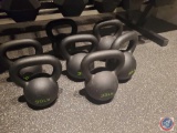 Group of higher weight kettle bells. Weights include two 40 lbs, three 35 lbs, and three 30 lbs....