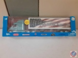 (1)1:32 Scale Diecast God Bless America tractor and trailer trailer lights up battery operated.