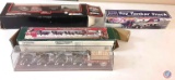 (1) Budweiser Clydesdale 8 horse hits mechanical Bank,(1)1:43 scale racing team transporter with