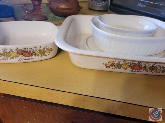 Assortment of Corning ware casserole dishes, with the Spice of life pattern. Also the plain white