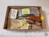 (1) Flat First Aid Kit, Leather Gloves, Channel Locks, Spur, Aluminum Oxide Cloth Sanding Belt