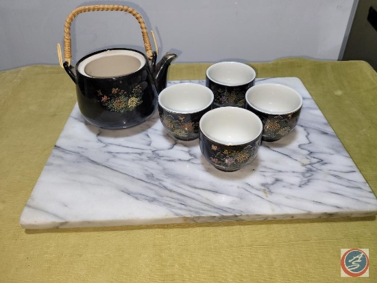Black tea pot and cups