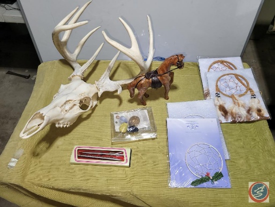 Animal head and adntlers, leather horse and dream catchers