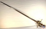 Sword 50 in. Swept hilt beauty. No blade markings but a thin little cross with 3 knobbed ends. May